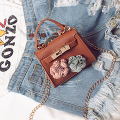 New Female Children Bag Mini Kylie Bag Handbag Fashion Tide Flower Bag Shoulder Messenger Bag.