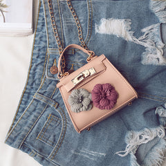 New Female Children Bag Mini Kylie Bag Handbag Fashion Tide Flower Bag Shoulder Messenger Bag.