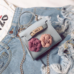 New Female Children Bag Mini Kylie Bag Handbag Fashion Tide Flower Bag Shoulder Messenger Bag.