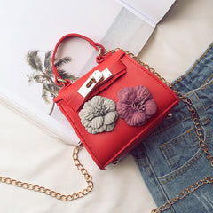 New Female Children Bag Mini Kylie Bag Handbag Fashion Tide Flower Bag Shoulder Messenger Bag.