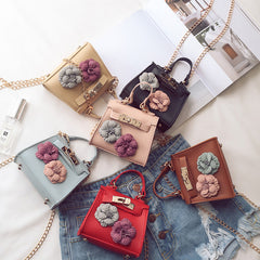 New Female Children Bag Mini Kylie Bag Handbag Fashion Tide Flower Bag Shoulder Messenger Bag.