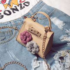 New Female Children Bag Mini Kylie Bag Handbag Fashion Tide Flower Bag Shoulder Messenger Bag.